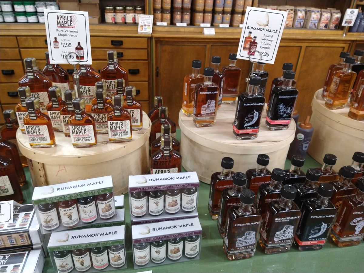 A display of Runamok and other types of maple syrup at a store in Vermont.